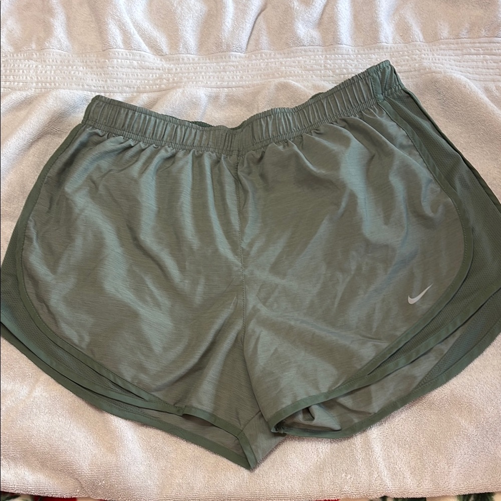Nike Green Athletic Shorts with Curved Hem and Elastic Waistband